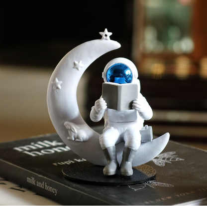 Astronaut Reading on Moon Showpiece