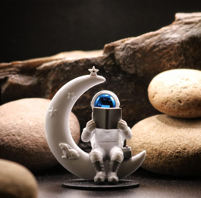 Astronaut Reading on Moon Showpiece