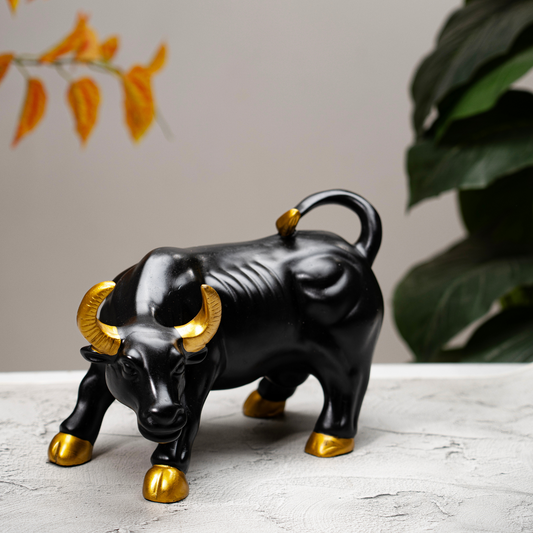 Elegant Black Bull Figurine With Golden Accents