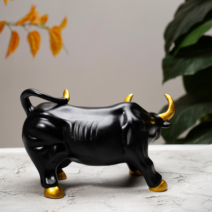 Elegant Black Bull Figurine With Golden Accents