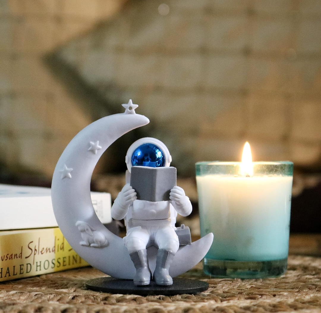 Astronaut Reading on Moon Showpiece
